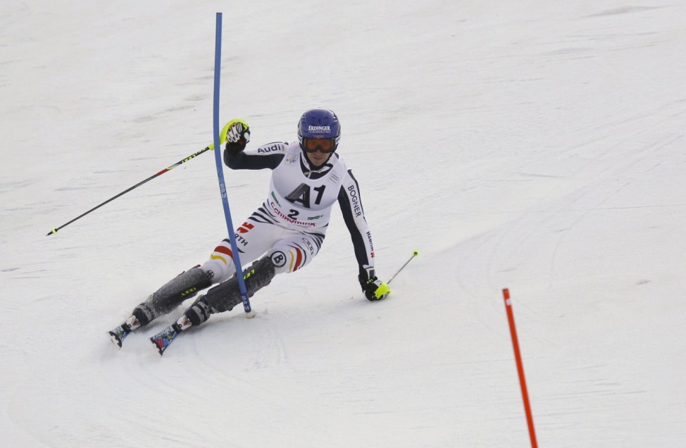 Germany's Neureuther clears a gate during the men's slalom race at the World Cup finals in Schladming