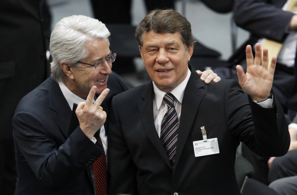 Hertha BSC Berlin's coach Rehhagel and German anchor Elstner gesture before Germany's Federal Assembly in Berlin