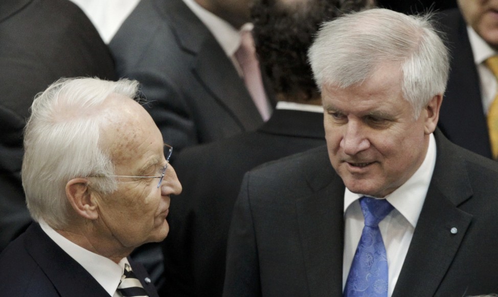 State premier and leader of Bavaria's Christian Social Union (CSU) Seehofer and former Bavarian state premier Stoiber chat before Germany's Federal Assembly in Berlin