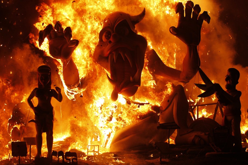 Effigies burn during the finale of the Fallas festival in Valencia
