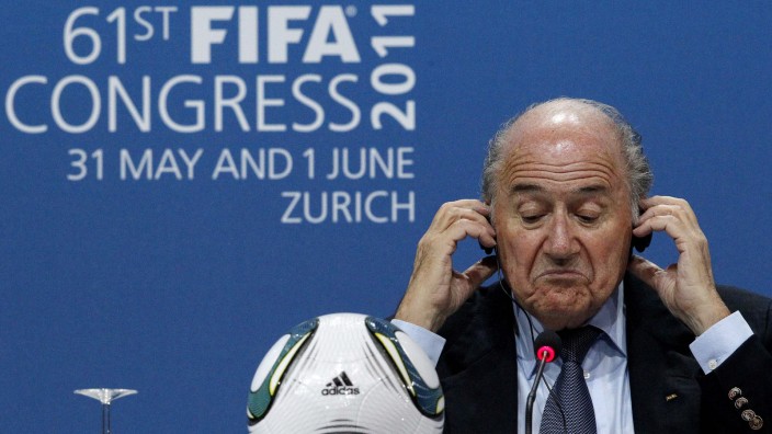 FIFA president Blatter reacts during a news conference after being re-elected as president of world soccer's governing body during the 61st FIFA congess in Zurich