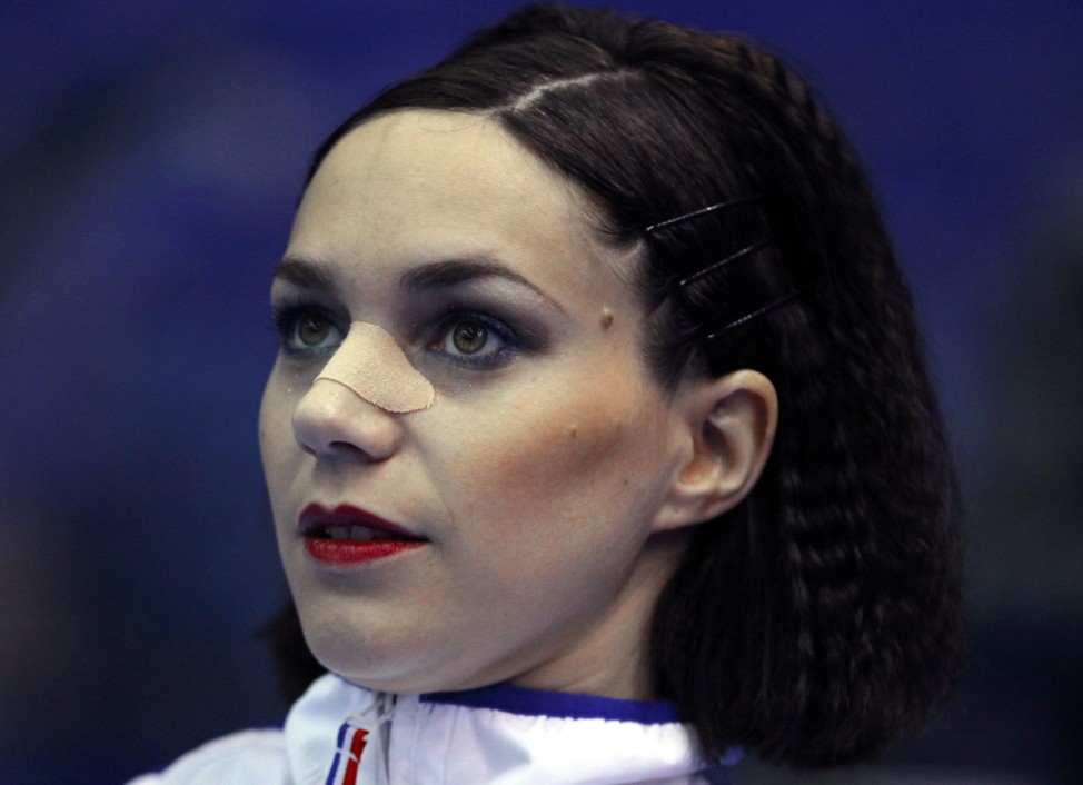 Nathalie Pechalat of France waits for the start of a training at the World Figure Skating Championships in Nice