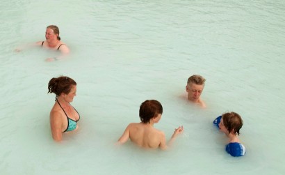 Island: Tourists relax in one of the Blue Lagoon mineral pools near Reykjavik
