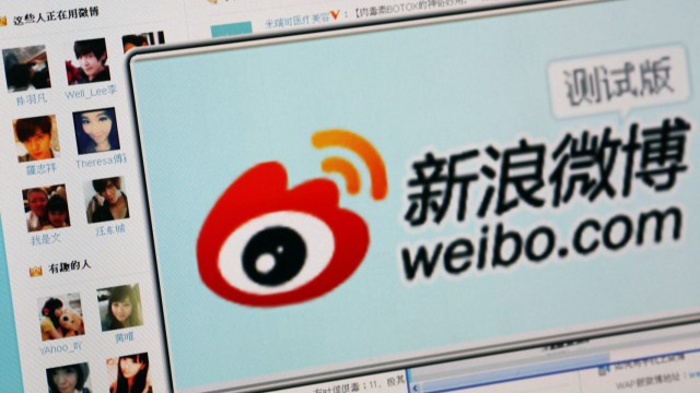 The logo of Sina Corp's Chinese microblog website 'Weibo' is seen on a screen in this photo illustration taken in Beijing