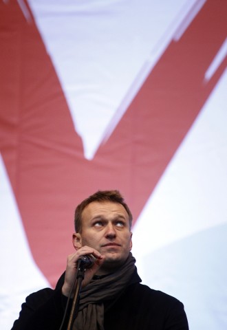 Anti-corruption blogger Navalny speaks from a stage during a protest against recent parliamentary election results in Moscow