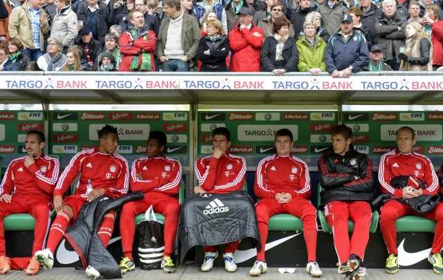 Bayern Munich's players Ribery, Boateng, Alaba, Gomez, Kroos,  Butt, Robben and Lahm sit on the bench during the German Bundesliga first division soccer match against Werder Bremen in Bremen