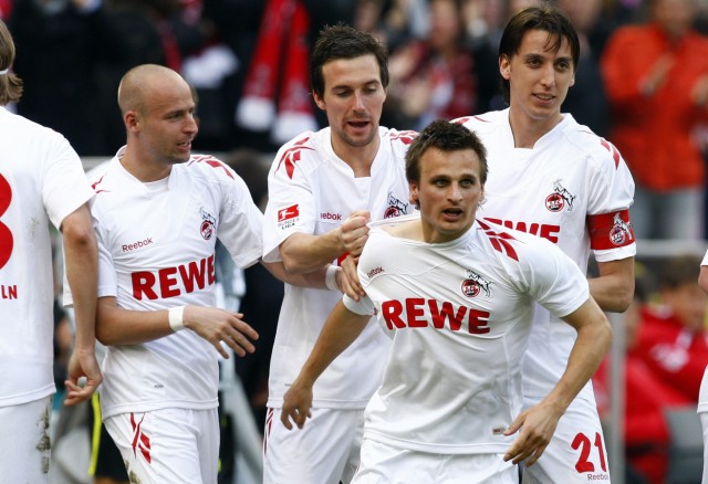Cologne's Peszko celebrates goal during their German Bundesliga soccer match against Stuttgart in Cologne