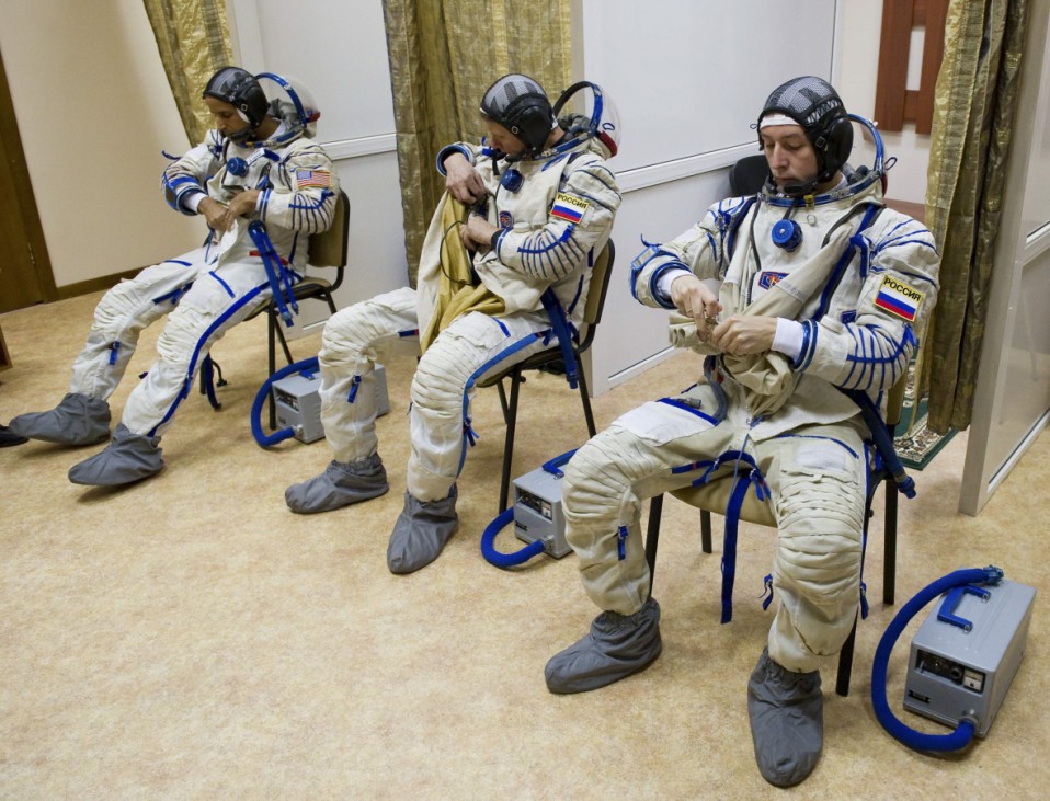 U.S. astronaut Acaba and Russian cosmonauts Revin and Padalka take part in a training session at the Star City space centre outside Moscow
