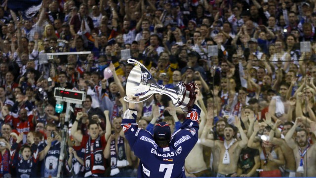 Frank Hoerdler, player of new German champion Eisbaeren Berlin celebrates their victory in the fifth match of the final best-of-five series of the German Ice Hockey League against Adler Mannheim in Berlin