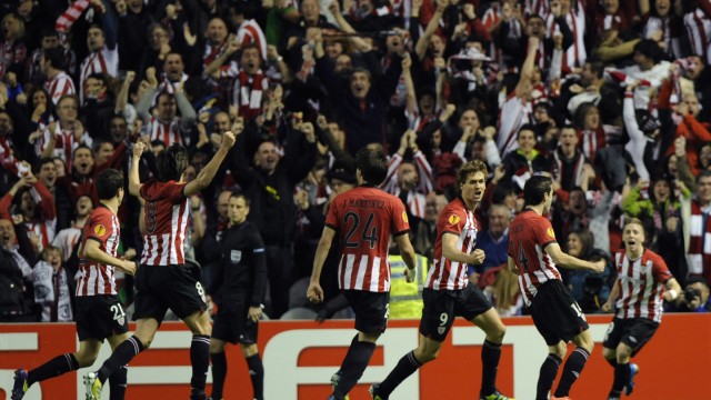 Athletic Bilbao players celebrate a goal against Sporting during their Europa League semi-final second leg soccer match at San Mames stadium in Bilbao