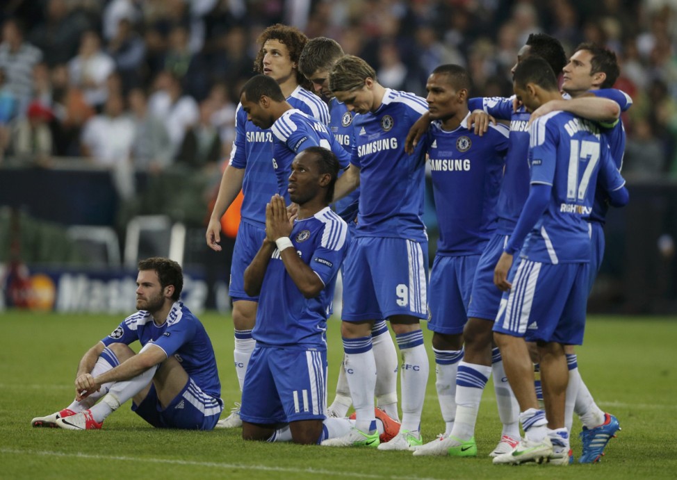 Chelsea's players react during a penalty shootout during their Champions League final soccer match against Bayern Munich at the Allianz Arena in Munich