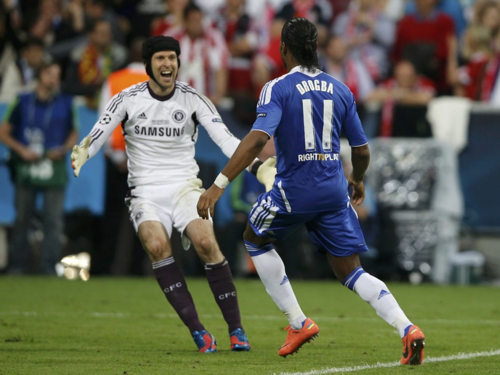 Goalkeeper Cech and Drogba of Chelsea celebrate winning their Champions League final soccer match against Bayern Munich at the Allianz Arena in Munich
