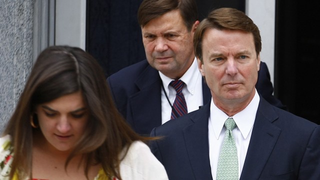 Former U.S. Senator John Edwards leaves the federal courthouse with his daughter Cate during a break in Greensboro