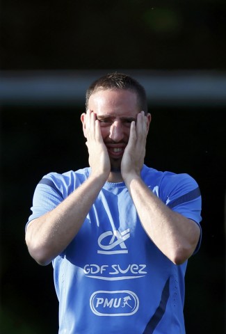 French soccer players Ribery reacts during training session at the team's training center in Kircha near Donetsk during the Euro 2012
