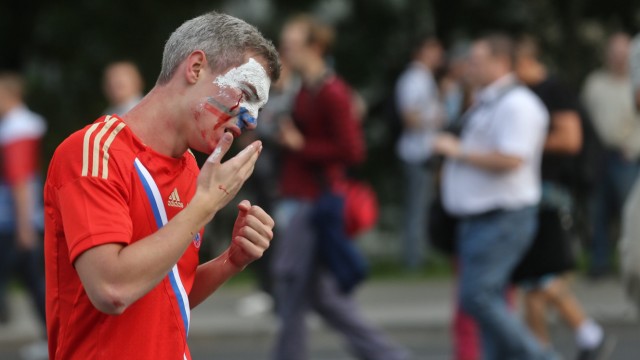 Russian and Polish supporters clash