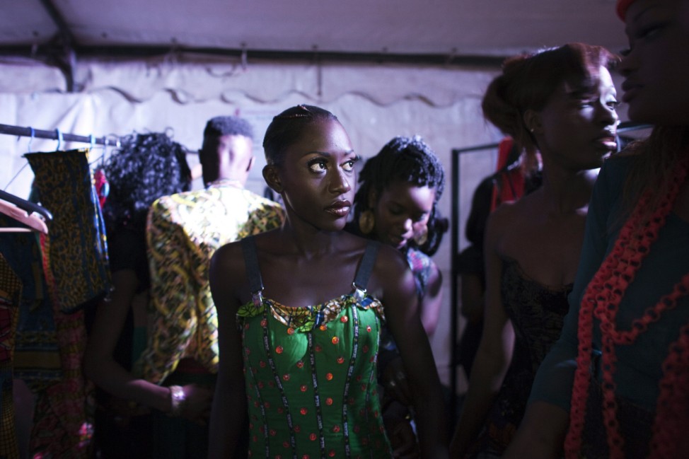 Models wait backstage during Dakar Fashion Week