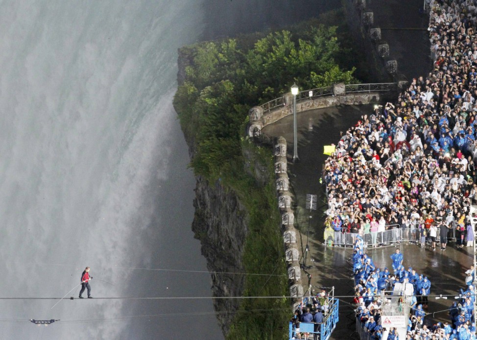 Tightrope walker Wallenda walks the high wire over the Horseshoe Falls in Niagara Falls