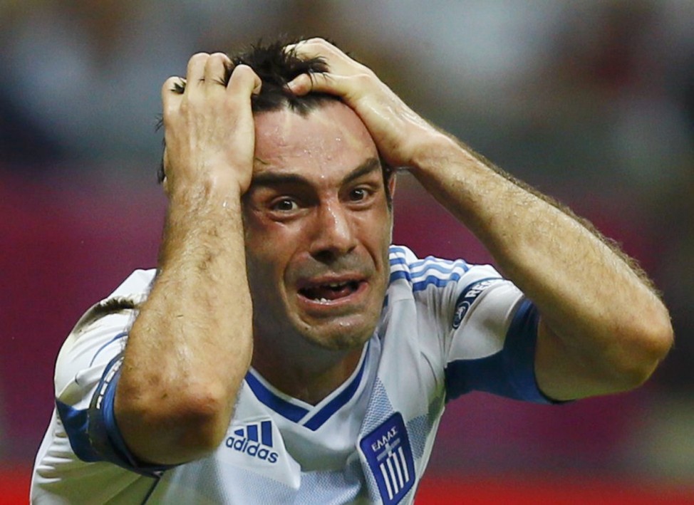 Greece's Karagounis reacts during the Group A Euro 2012 soccer match against Russia at National stadium in Warsaw