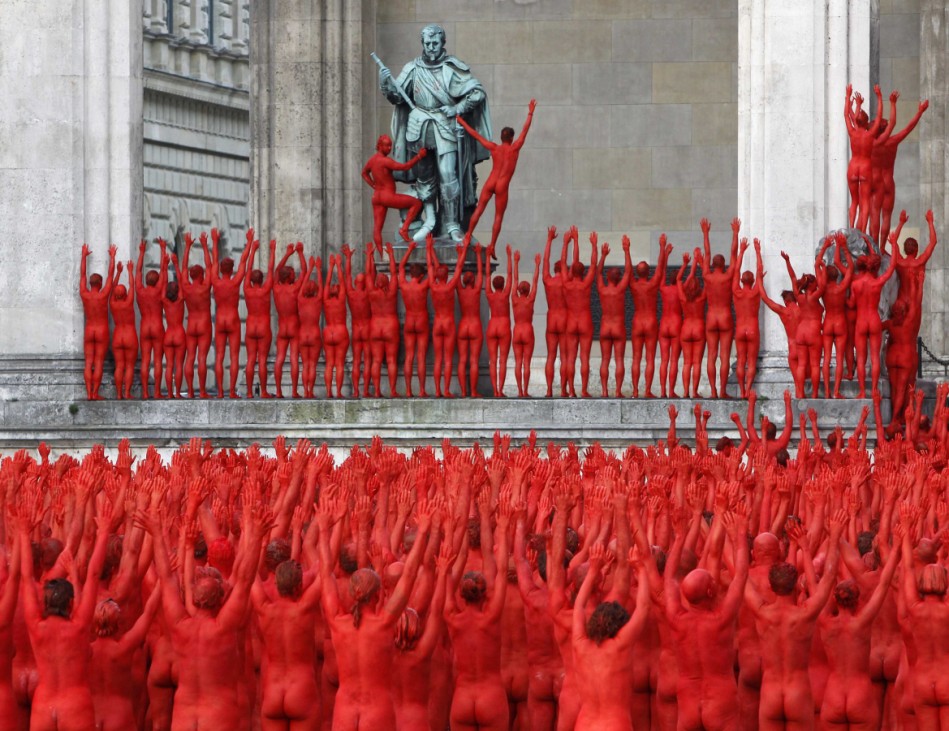 Naked volunteers pose for U.S. artist Spencer Tunick in downtown Munich