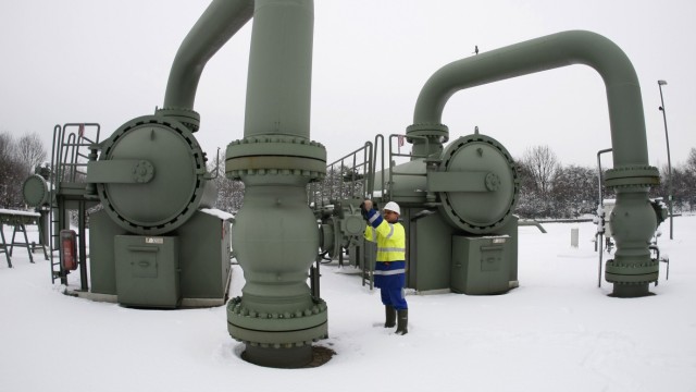 File photo of technician of RWE controling a compressor station in the western town of Huenxe