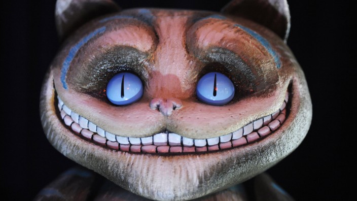 A 'Cheshire Cat' maquette from the film 'Alice in Wonderland' is displayed at the D23 Presents Treasures of the Walt Disney Archives exhibit in California