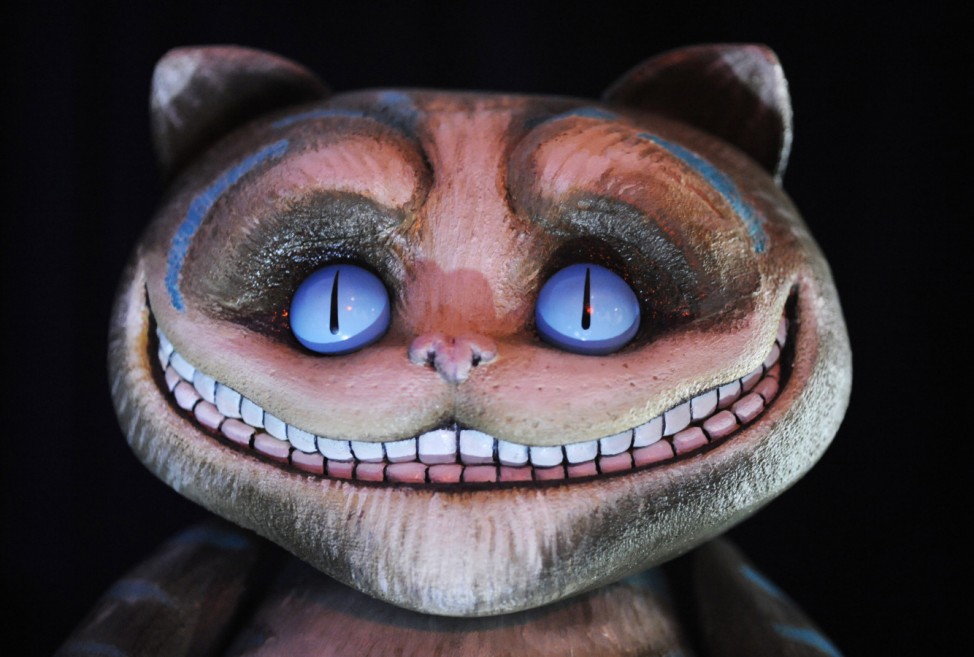 A 'Cheshire Cat' maquette from the film 'Alice in Wonderland' is displayed at the D23 Presents Treasures of the Walt Disney Archives exhibit in California