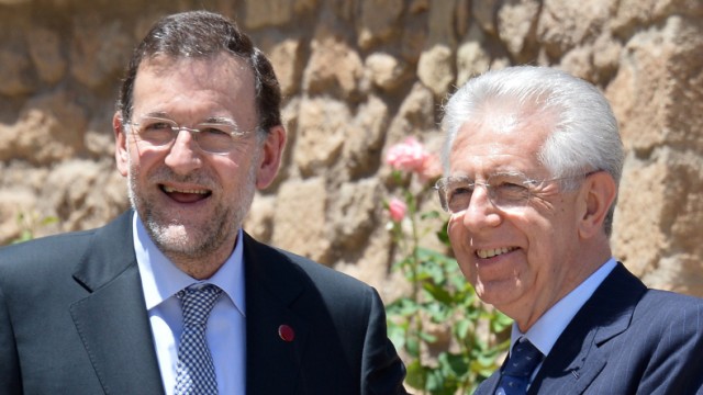 Einigung beim EU-Gipfel: Hier haben sie ihre Strategie für den Euro-Gipfel besprochen: Spaniens Mariano Rajoy und Italiens Mario Monti vor einer Woche in Rom.