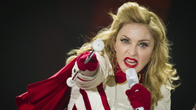 US pop singer Madonna performs during a concert of her MDNA world tour in Berlin