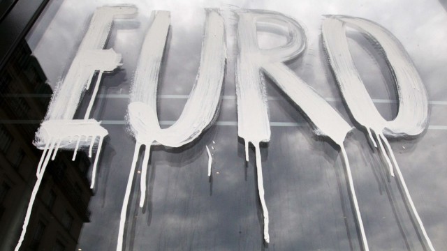 Word 'Euro' is painted onto glass door of Academy of Arts in Berlin
