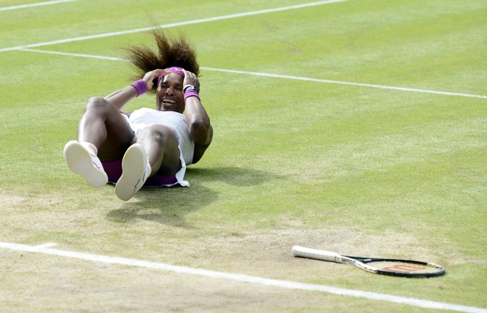 Serena Williams of the U.S. celebrates after defeating Agnieszka Radwanska of Poland in their women's final tennis match at the Wimbledon tennis championships in London