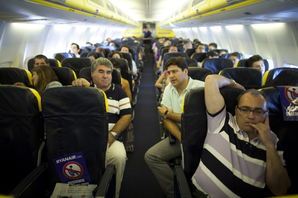Jose Manuel Abel sits on a Barcelona bound flight in Seville