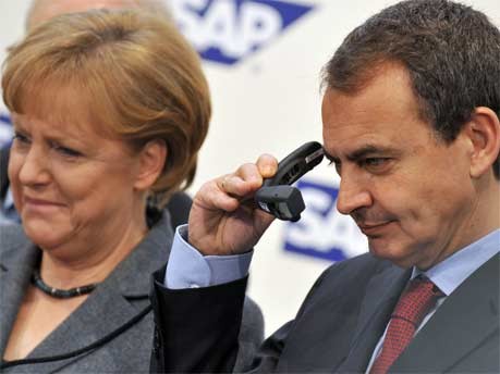 Merkel, Zapatero, dpa