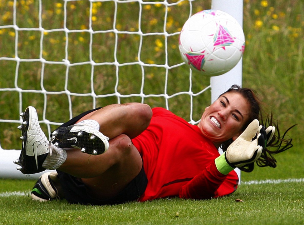 Solo, goalkeeper from U.S. women's Olympic soccer team, makes save during training session ahead of London 2012 Olympic Games, in Glasgow