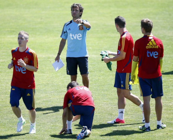 Spain´s olympic soccer coach Luis Milla gives instructions to his players during a training session at the Soccer City area in Las Rozas
