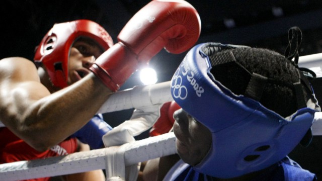 DeGale of Britain fights Correa of Cuba during their men's middleweight (75kg) final boxing match at the Beijing 2008 Olympic Games