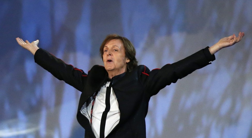 Former Beatle Paul McCartney sings during the opening ceremony of the London 2012 Olympic Games