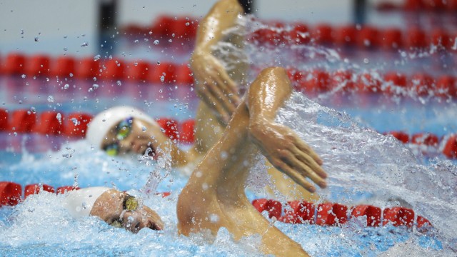 Schwimmen bei Olympia: Hauchdünn vorne: Yannick Agnel (Frankreich) gegen US-Schwimmer Ryan Lochte.