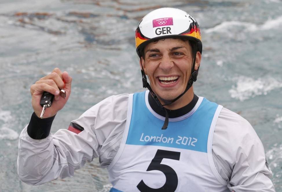 Germany's Sideris Tasiadis celebrates winning the silver medal after the men's canoe single (C1) final at Lee Valley White Water Centre during the London 2012 Olympic Games