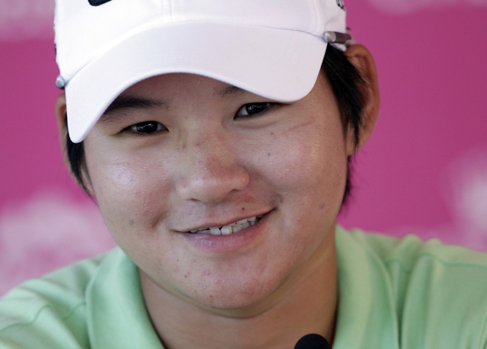 Tseng of Taiwan smiles during a news conference ahead of the 18th Evian Masters golf tournament in Evian