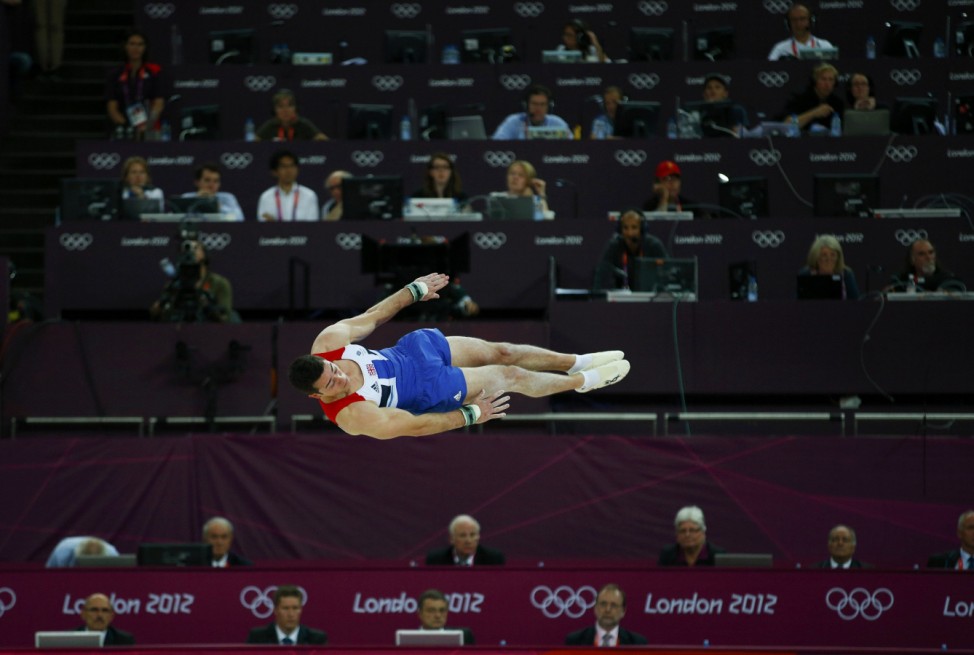 Kristian Thomas of Britain competes in the floor exercise during the men's individual all-around gymnastics final in the North Greenwich Arena during the London 2012 Olympic Games