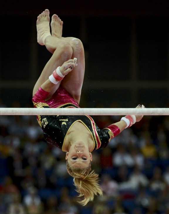 Elisabeth Seitz of Germany performs on the asymmetric bars during the women's individual all-around gymnastics final in the North Greenwich Arena at the London 2012 Olympic Games