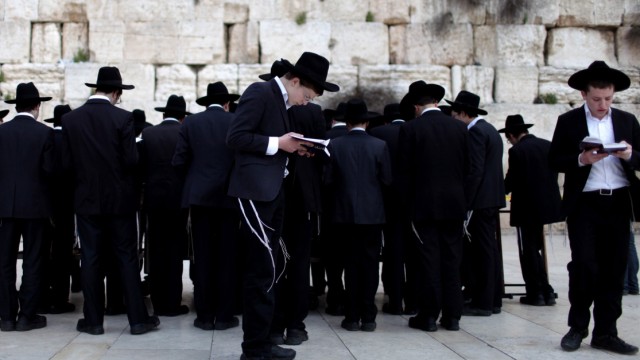 Ultra Orthodox Jews pray at the Western Wall