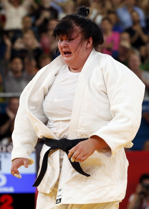 Ukraine's Iryna Kindzerska cries after losing her women's +78kg bronze medal judo match against Britain's Karina Bryant at the London 2012 Olympic Games