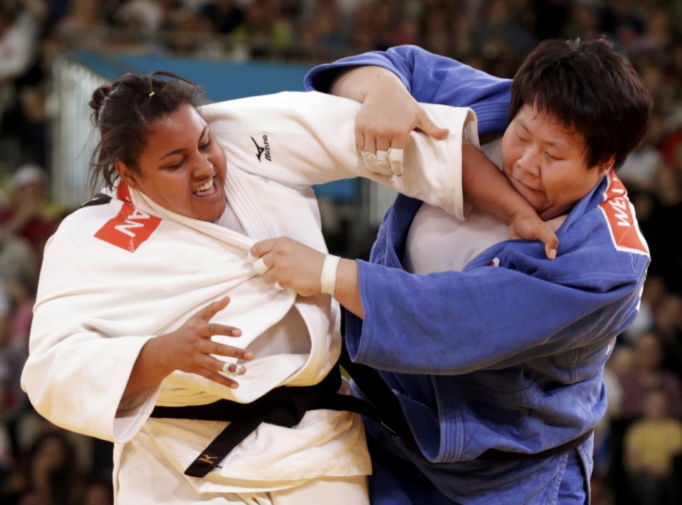 Brazil's Maria Suelen Altheman fights with China's Tong Wen during their women's +78kg bronze medal judo match at the London 2012 Olympic Games
