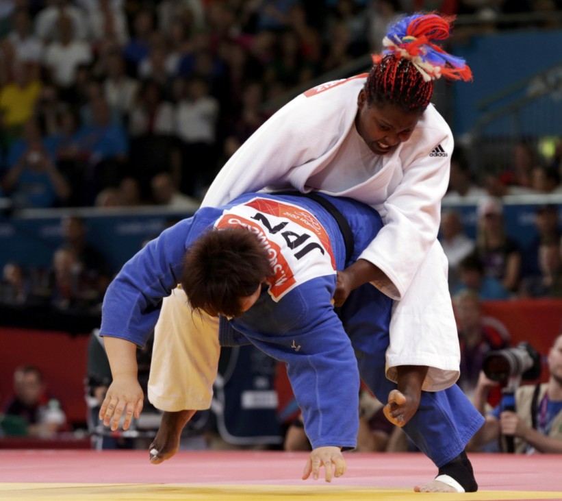 Cuba's Idalys Ortiz fights with Japan's Mika Sugimoto during their women's +78kg gold medal judo match at the London 2012 Olympic Games