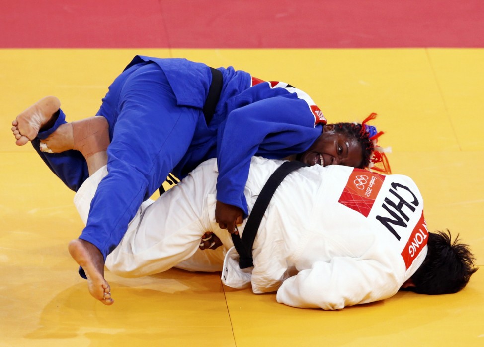 Cuba's Idalys Ortiz fights with China's Tong Wen during their women's +78kg semifinal judo match at the London 2012 Olympic Games
