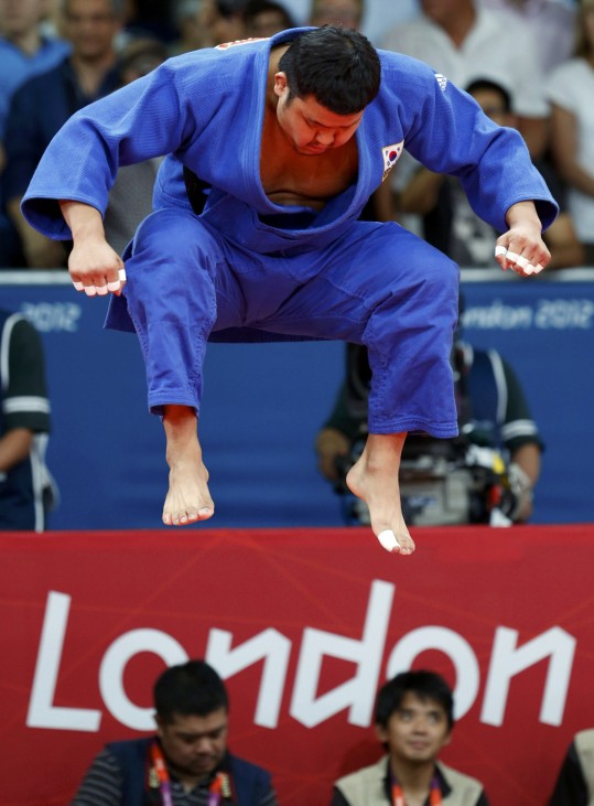 South Korea's Kim Sung-min jumps before his men's +100kg semifinal judo match against France's Teddy Riner at the London 2012 Olympic Games