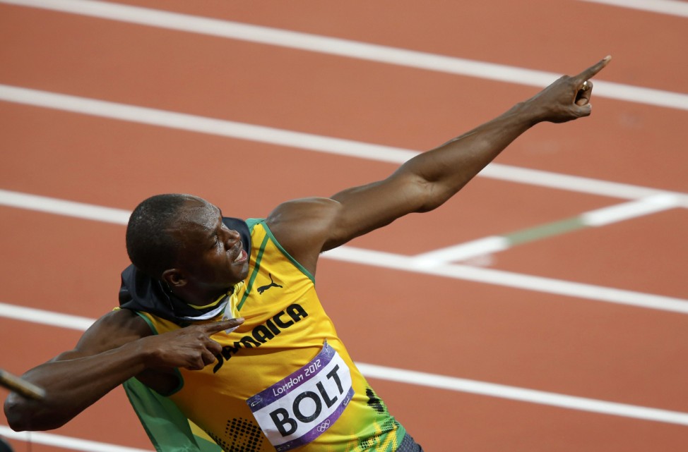 Jamaica's Usain Bolt celebrates after winning the men's 100m final during the London 2012 Olympic Games at the Olympic Stadium
