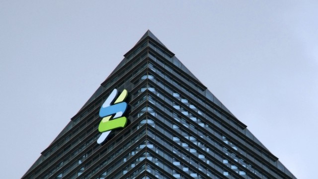 File photo of the logo of Standard Chartered at its Singapore office at the Marina Bay Financial Centre
