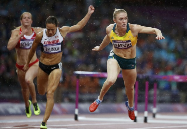 Australia's Sally Pearson looks to her left as she crosses the finish line in the women's 100m hurdles final during the London 2012 Olympic Games